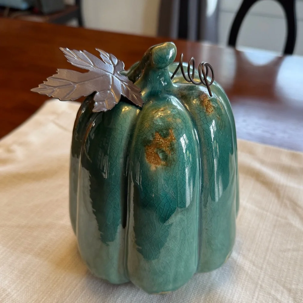 Ceramic pumpkin with metal leaf accent